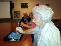 91-year old Rita O’Brien participates in the weekly iPad class held every Thursday afternoon at Spring Hills Lake Mary Assisted Living in Orlando.
